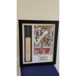 CRICKET, signed miniature bat by Shane Warne, attractively mounted with 9.5 x 14.5 colour photo,
