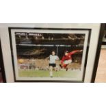 FOOTBALL, signed colour print by Geoff Hurst, showing him scoring the final goal of the 1966 WC