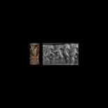 Western Asiatic Early Dynastic II Silver Cylinder Seal with Fighting Animal Scene