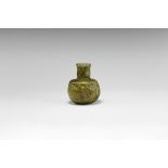 Frankish Pinched Green Glass Bottle