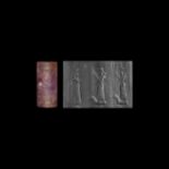 Large Western Asiatic Neo Assyrian Cylinder Seal with Gods Marduk, Nabû, Ninurta and Goddess Gula