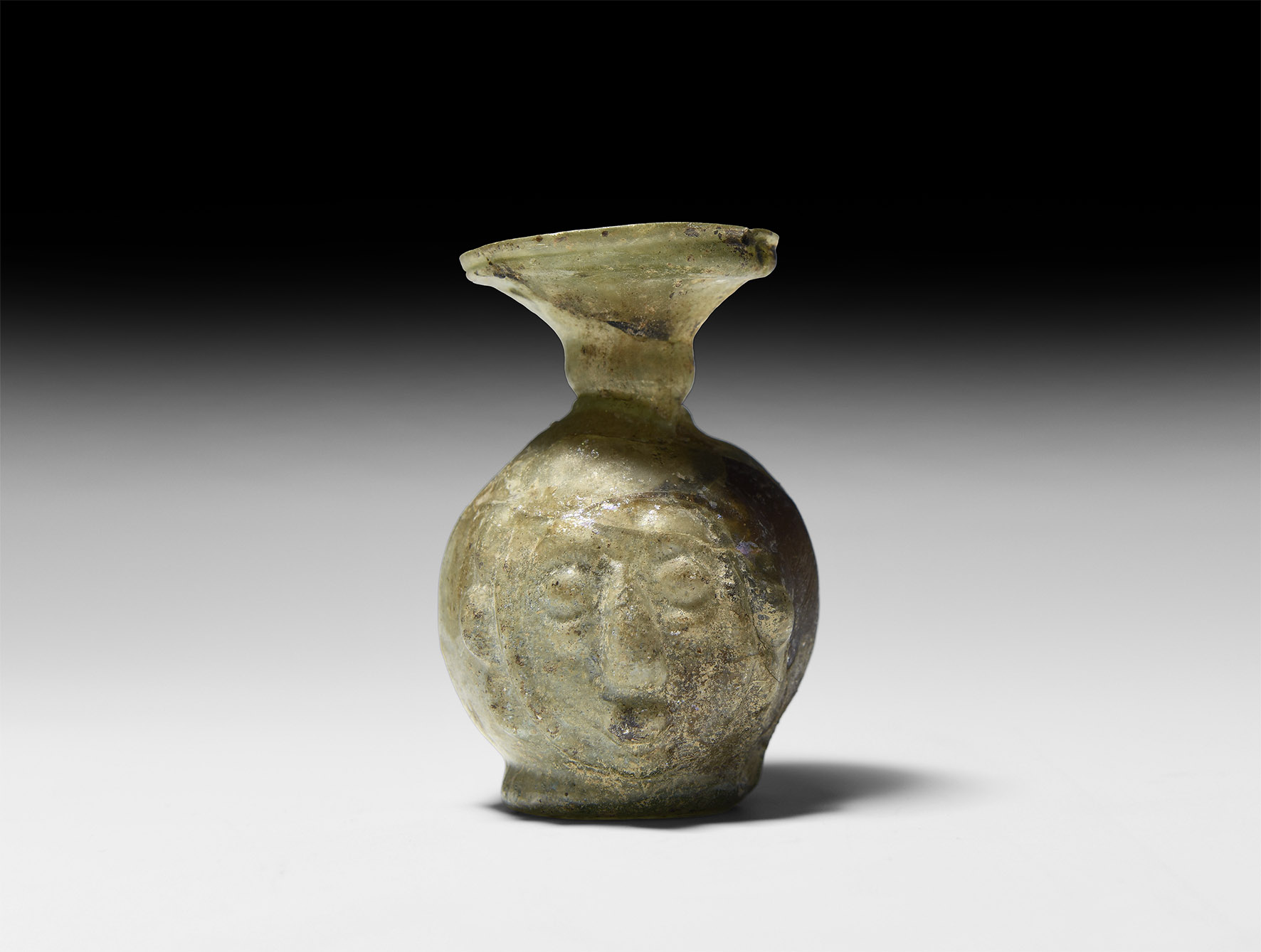 Roman Glass Head Flask