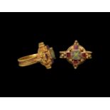 Hunnish Gold Ring with Millefiori and Garnets