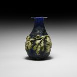 Roman Blue Glass Vessel with Vine Leaf Design