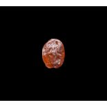 Carnelian Gemstone with Kneeling Figure