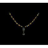 Islamic Gold-in-Glass and Jet Bead Necklace