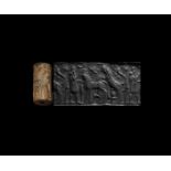 Neo-Assyrian Cylinder Seal with Bull Mounting Suckling Cow and Farmer Scene