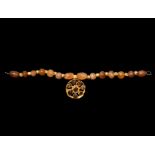 Roman Gold Wheel Pendant with Beads