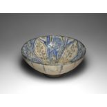 Islamic Iridescent Blue and White Glazed Foliate Bowl