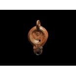 Roman Oil Lamp with Bust and Maker's Mark 'LMADIEC'