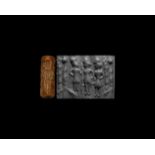 Cylinder Seal with Standing Figures Holding Staffs