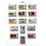 A collection of Channel Islands and Isle of Man stamps in four boxed printed Stanley Gibbons albums,