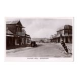 A collection of approximately 52 postcards of South Africa, including photographic postcards