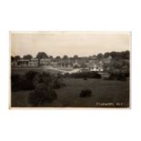 A collection of postcards in six albums, the majority topographical views or postcards of