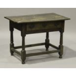 An 18th century and later oak lowboy, fitted with a single frieze drawer, raised on turned and block