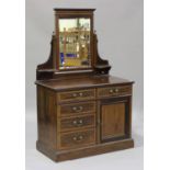 An Edwardian mahogany and satinwood crossbanded dressing chest by Maple & Co, fitted with five