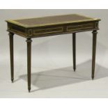 An early 20th century Louis XVI style mahogany and gilt metal mounted writing table, the top inset