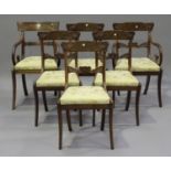 A set of five Regency mahogany bar back dining chairs, comprising one carver and four standards,