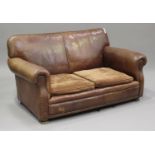 A mid/late 20th century brown leather two-seat sofa by Tetrad with brass studwork decoration, on bun