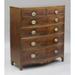 A late George III mahogany bowfront chest with ebony and boxwood stringing, fitted with two short