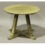 An early 20th century limed oak circular occasional table, in the manner of Heals, height 56cm,