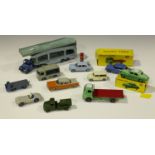 A small collection of Dinky Toys cars, commercial vehicles and accessories, including a No. 432