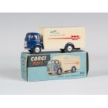 A Corgi Toys No. 453 Commer refrigerator van 'Walls', finished in blue and cream with spun hubs,