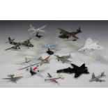 A collection of model civilian and military aircraft, including a Hercules C-130 US Coast Guard, a