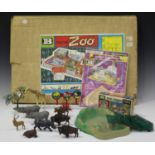 A collection of Britains plastic zoo figures and accessories, including various wild animals, fences