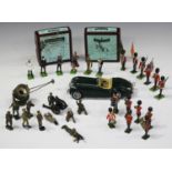 A collection of Britains and other lead soldiers, bandsmen and sailors, together with a Bburago