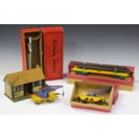 A small collection of Hornby Series gauge O railway items, including two crane trucks, an American