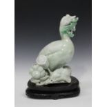 A Chinese hardstone carving, mid to late 20th century, modelled as a goose standing upon rocks