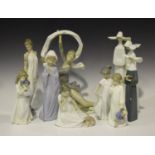Two Lladro porcelain figures, comprising Praying Moment, No. 5500, and Nuns, No. 4611, together with