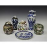 A Chinese blue and white porcelain vase and cover, mark of Kangxi but late 19th century, painted