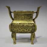 A Chinese archaistic gilt bronze fang-ding censer, mark of Xuande but 20th century, the