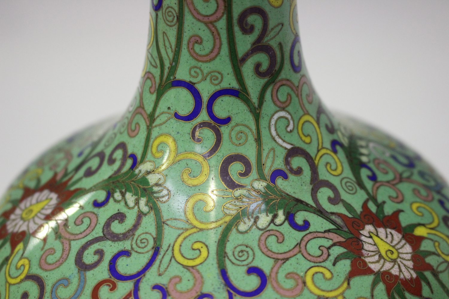 A Chinese cloisonné pale green ground bottle vase, early 20th century, the bulbous body with - Image 2 of 5