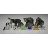 A collection of assorted ceramic and glass animals and figures, including a Plichta mottled pink