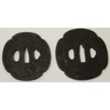 Two Japanese iron tsuba, Edo period, each of quatrelobed outline, one cast in low relief with