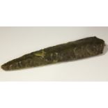 A Danish Neolithic chipped flint dagger, bearing label detailed '1870 Gutman Denmark Charles Keen