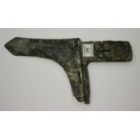 A Chinese archaic bronze dagger axe head, probably Han dynasty, covered in a verdigris patination,