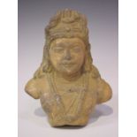 An Indian Gandhara carved stone bust of a bodhisattva, possibly 2nd/3rd century, finely carved