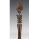 A Buka Island palmwood ceremonial paddle, Solomon Islands, Melanesia, the Janus head finial with a