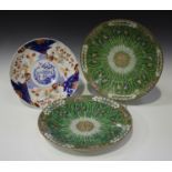 A pair of Chinese Canton export porcelain circular dishes, early 20th century, each painted with