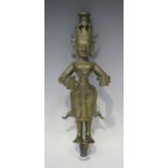 A South Indian bronze votive lamp figure of Lakshmi, 18th/19th century, modelled standing, holding