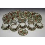A Chinese Canton famille rose exportware part tea service, 20th century, decorated with panels of