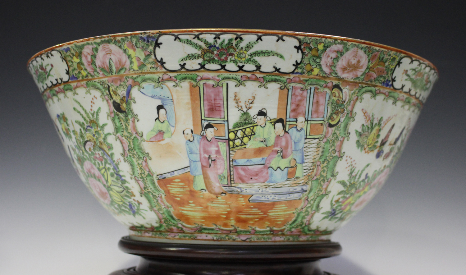 A Chinese Canton famille rose porcelain punchbowl, mid to late 19th century, the interior and - Image 12 of 13