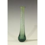 A Roman glass teardrop perfume phial of elongated bottle form with bulbous end, length 11.8cm.