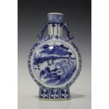 A Chinese blue and white porcelain moonflask, mark of Kangxi but late 19th century, the flattened