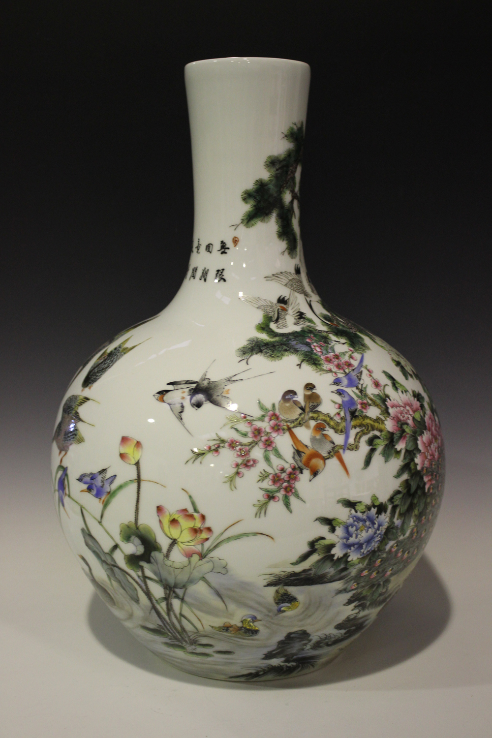 A Chinese famille rose porcelain bottle vase, modern, painted with an array of different birds - Image 7 of 7