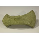 A Danish Neolithic pecked stone axe head of part perforated boat form, bearing 'F.S. Clark